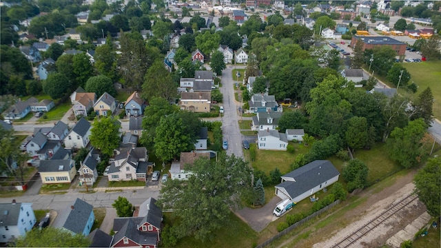 12 Court St, Rochester, NH 03867 - aerial view of property and surrounding area with nearby suburban area