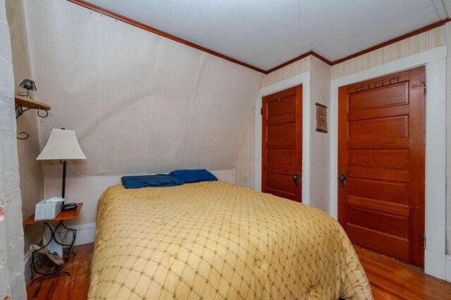 12 Court St, Rochester, NH 03867 - bedroom featuring ornamental molding and wood finished floors