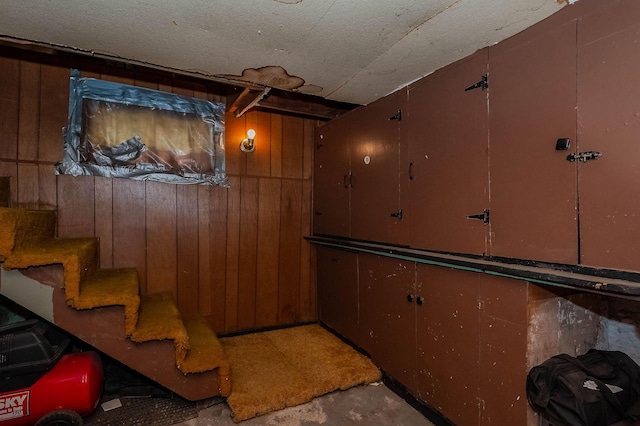 12 Court St, Rochester, NH 03867 - basement with wood walls and stairs