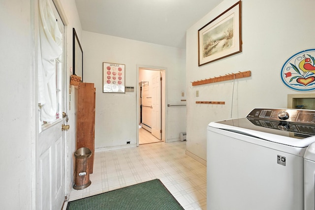 15 Loon Call Dr, Belgrade, ME 04917 - laundry room featuring washer / clothes dryer, a baseboard radiator, and tile patterned floors