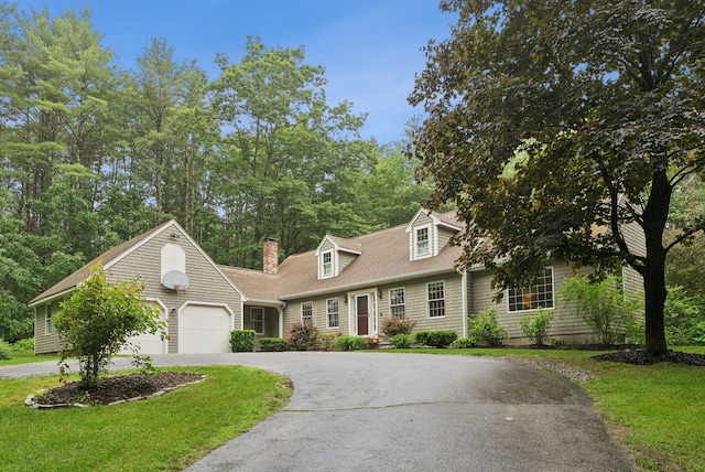 3 Flintlock Ln, Falmouth, ME 04105 - view of front facade with curved driveway, a garage, a front lawn, a chimney, and a shingled roof