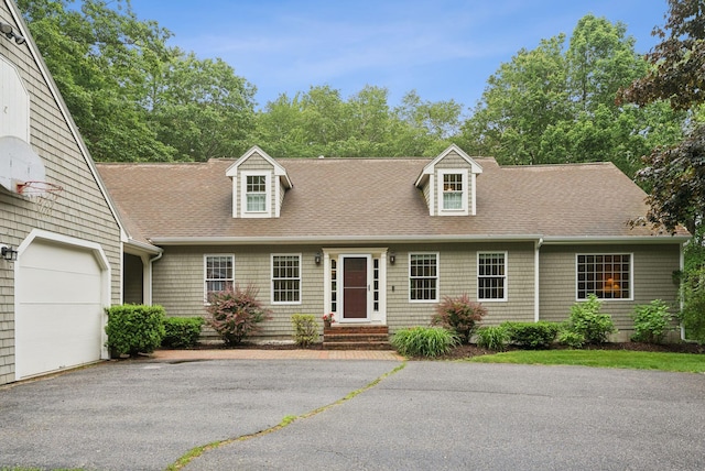 3 Flintlock Ln, Falmouth, ME 04105 - cape cod home with roof with shingles, asphalt driveway, and an attached garage