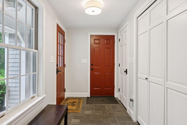 3 Flintlock Ln, Falmouth, ME 04105 - doorway with plenty of natural light and stone finish floors