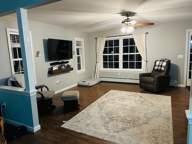 905 Blackstream Rd, Hermon, ME 04401 - living area featuring a baseboard radiator, a ceiling fan, a baseboard heating unit, and wood finished floors