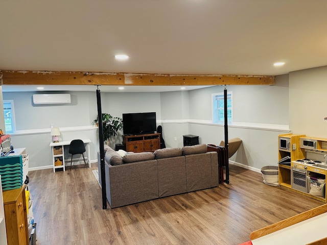 905 Blackstream Rd, Hermon, ME 04401 - living area with a wall mounted air conditioner, wood finished floors, and recessed lighting