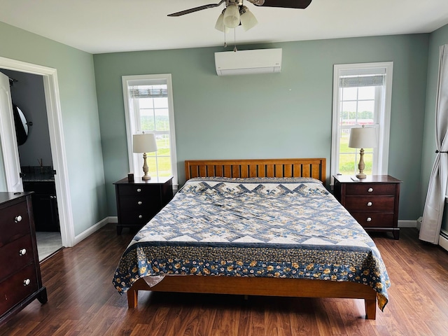 905 Blackstream Rd, Hermon, ME 04401 - bedroom with a wall mounted AC, multiple windows, dark wood-type flooring, and a ceiling fan