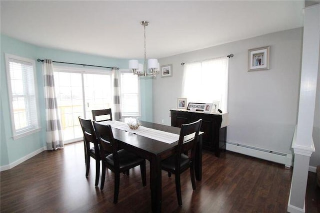 905 Blackstream Rd, Hermon, ME 04401 - dining area with baseboard heating, a chandelier, dark wood finished floors, and plenty of natural light