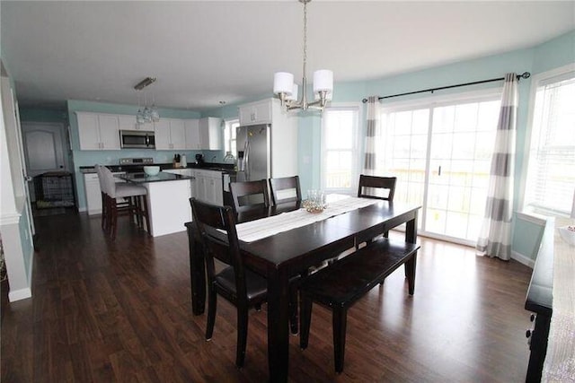905 Blackstream Rd, Hermon, ME 04401 - dining room featuring a chandelier and dark wood-style flooring