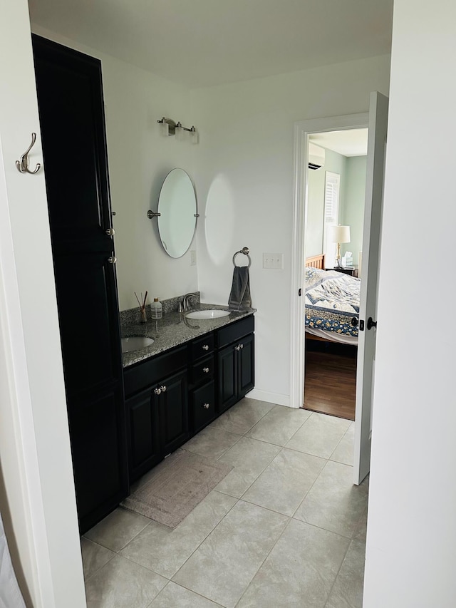 905 Blackstream Rd, Hermon, ME 04401 - ensuite bathroom with double vanity and tile patterned flooring