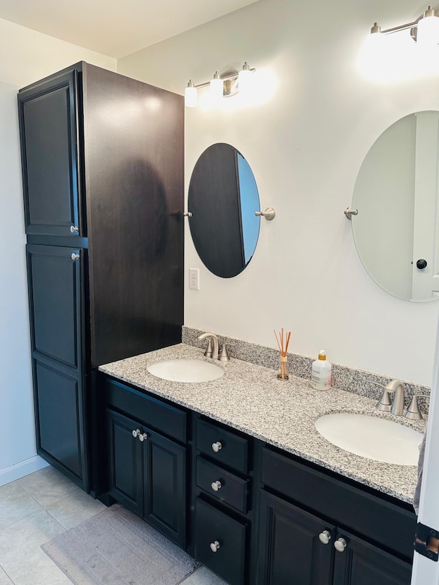 905 Blackstream Rd, Hermon, ME 04401 - bathroom featuring double vanity and tile patterned floors