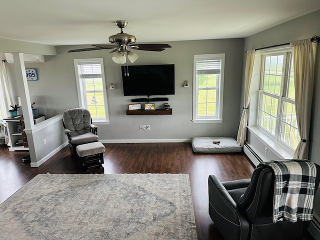 905 Blackstream Rd, Hermon, ME 04401 - living area with wood finished floors, a baseboard heating unit, and ceiling fan