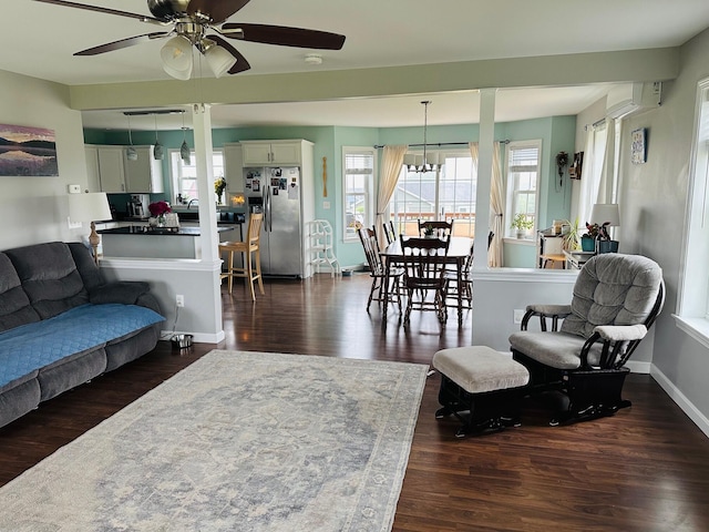 905 Blackstream Rd, Hermon, ME 04401 - living area featuring a ceiling fan, healthy amount of natural light, and dark wood-style floors