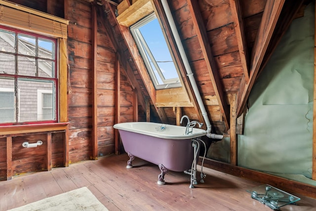 6 Fort Hill Ave, York, ME 03909 - full bath featuring a freestanding bath, hardwood / wood-style flooring, a skylight, lofted ceiling, and wooden walls