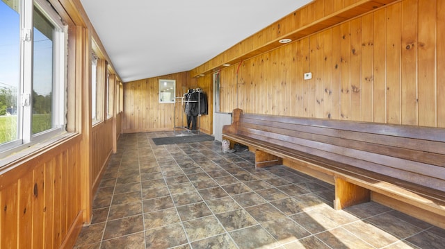 178 Potter Rd, Hudson, ME 04449 - unfurnished dining area featuring wood walls