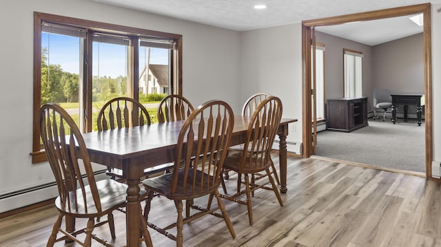 178 Potter Rd, Hudson, ME 04449 - dining space featuring light wood-style floors, a desk, recessed lighting, and a baseboard radiator