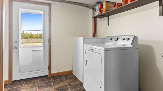 178 Potter Rd, Hudson, ME 04449 - washroom featuring independent washer and dryer and stone finish flooring