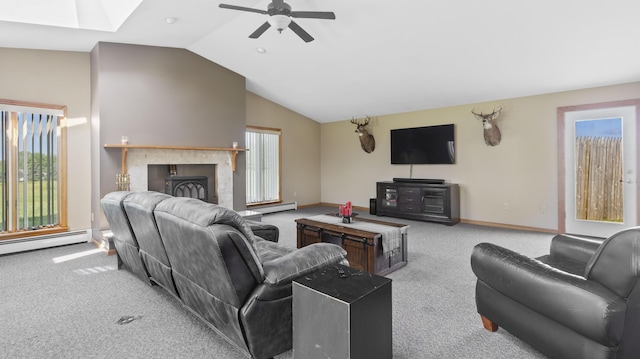 178 Potter Rd, Hudson, ME 04449 - living room featuring carpet flooring, a baseboard heating unit, vaulted ceiling, plenty of natural light, and a ceiling fan