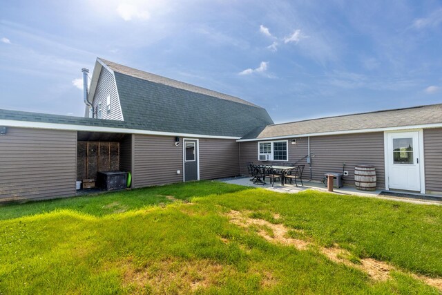 178 Potter Rd, Hudson, ME 04449 - rear view of property featuring a lawn, a patio, a gambrel roof, and a shingled roof