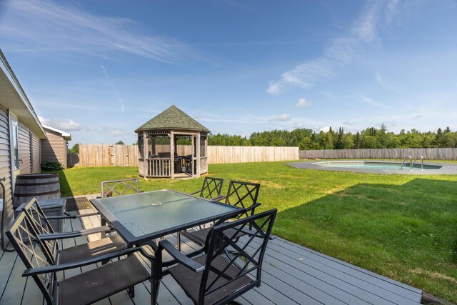 178 Potter Rd, Hudson, ME 04449 - deck featuring a gazebo, outdoor dining area, and a fenced backyard