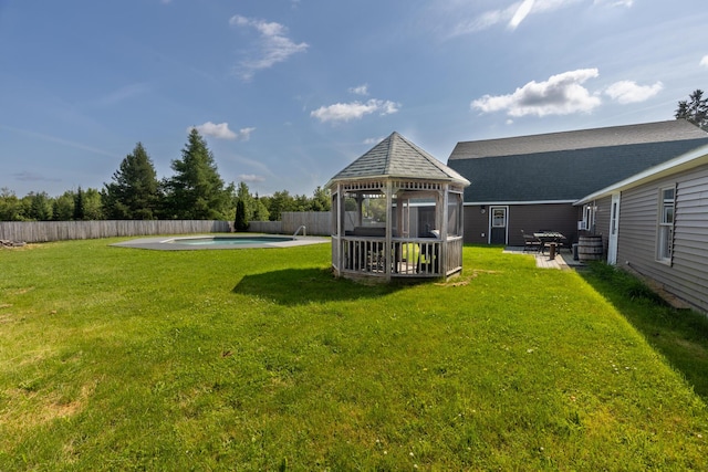 178 Potter Rd, Hudson, ME 04449 - fenced backyard with a gazebo and a patio area