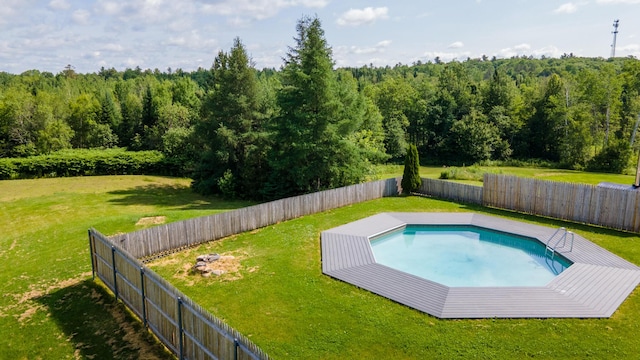 178 Potter Rd, Hudson, ME 04449 - view of swimming pool featuring a fenced backyard and a forest view