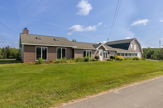 178 Potter Rd, Hudson, ME 04449 - view of front of home with a chimney and a front yard