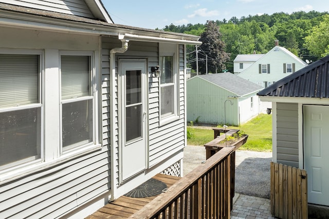 8 Riverview Ave, Lewiston, ME 04240 - wooden terrace with a storage shed
