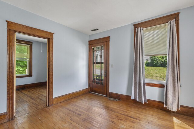 8 Riverview Ave, Lewiston, ME 04240 - entrance foyer with baseboards and light wood finished floors