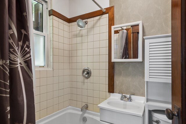 8 Riverview Ave, Lewiston, ME 04240 - bathroom featuring shower / bath combination with curtain, vanity, and a textured wall