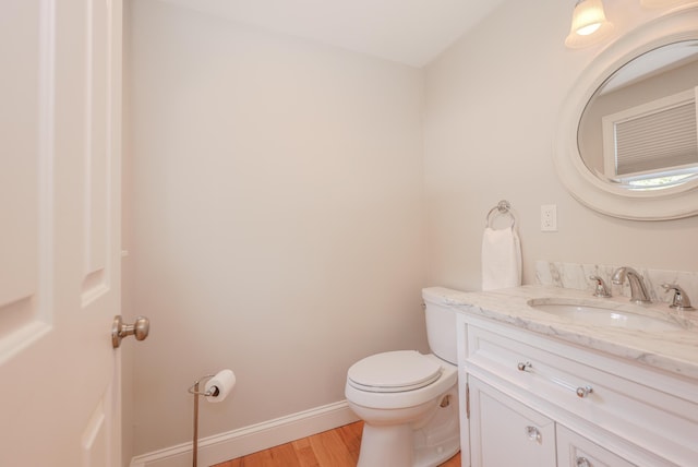 1 Ephraim Tyler Way Unit 1, Kennebunk, ME 04043 - half bathroom with wood finished floors and vanity