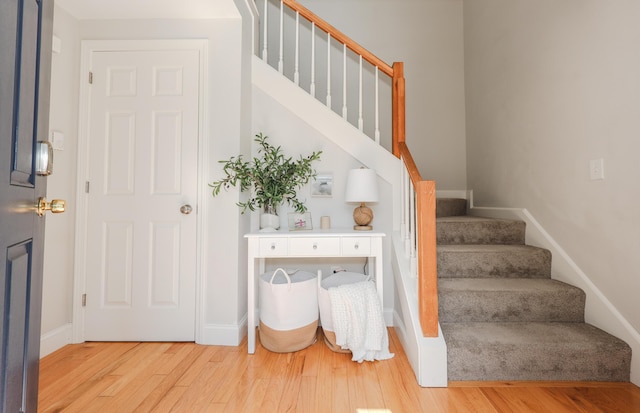 1 Ephraim Tyler Way Unit 1, Kennebunk, ME 04043 - stairway featuring wood finished floors