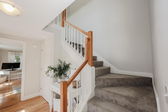 1 Ephraim Tyler Way Unit 1, Kennebunk, ME 04043 - staircase featuring wood finished floors and baseboards