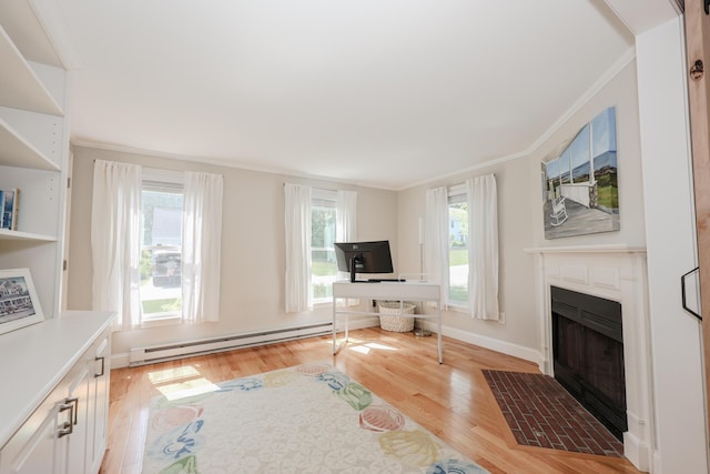 1 Ephraim Tyler Way Unit 1, Kennebunk, ME 04043 - unfurnished living room with baseboard heating, crown molding, light wood-type flooring, and a fireplace with flush hearth
