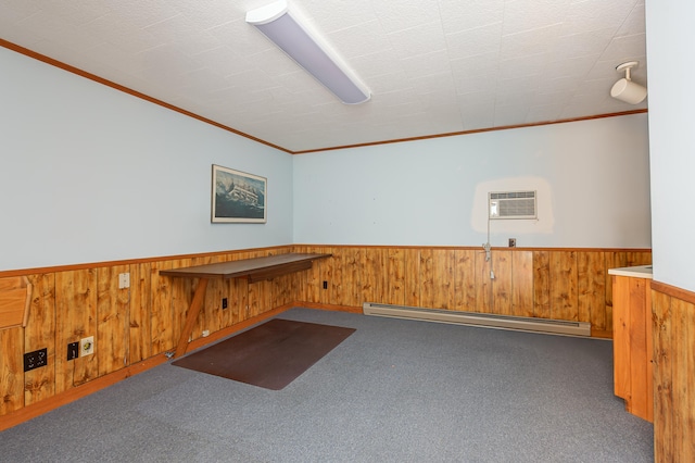 34 Old County Rd, Rockport, ME 04841 - carpeted empty room with a baseboard radiator, wainscoting, wood walls, crown molding, and a wall mounted air conditioner