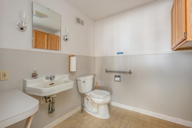 34 Old County Rd, Rockport, ME 04841 - half bathroom with toilet and baseboards
