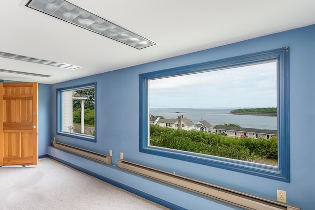 34 Old County Rd, Rockport, ME 04841 - detailed view of baseboard heating, nearby water, and speckle patterned floor