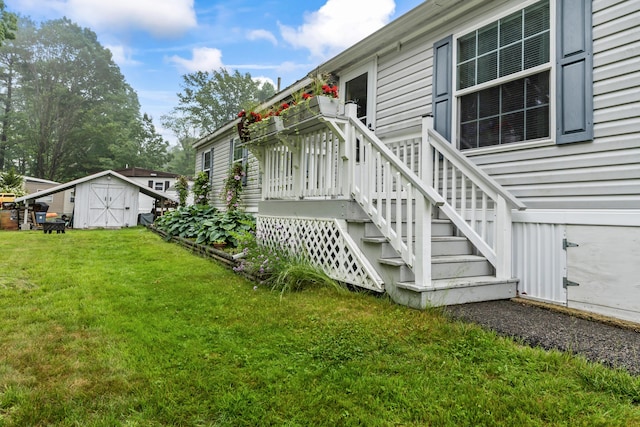 26 Caincrest Rd, York, ME 03909 - view of property exterior with a storage unit and a lawn