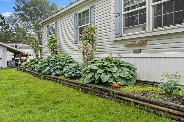 26 Caincrest Rd, York, ME 03909 - view of property exterior with a yard
