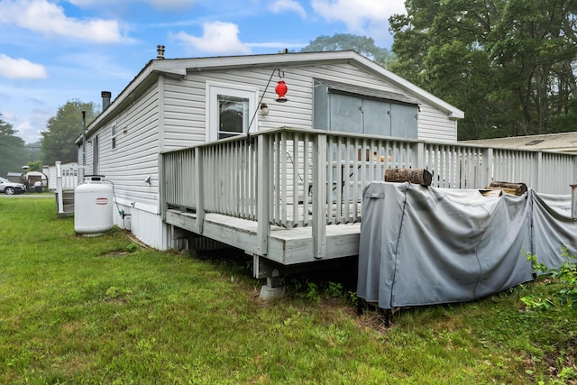 26 Caincrest Rd, York, ME 03909 - back of house featuring a wooden deck and a yard