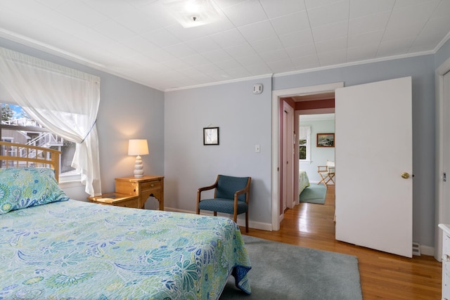 511 Webhannet Dr, Wells, ME 04090 - bedroom featuring ornamental molding and wood finished floors