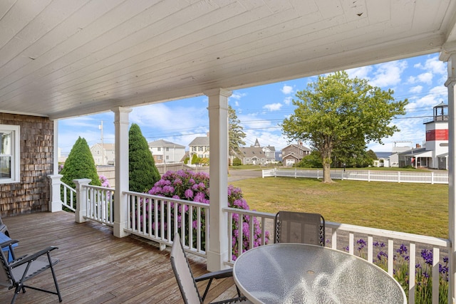 511 Webhannet Dr, Wells, ME 04090 - wooden terrace with a residential view, a yard, and outdoor dining space
