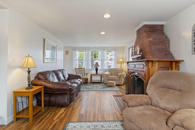 511 Webhannet Dr, Wells, ME 04090 - living area featuring wood finished floors, recessed lighting, and a fireplace