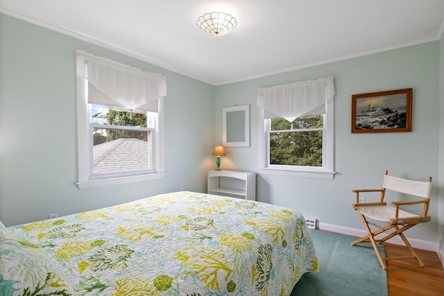 511 Webhannet Dr, Wells, ME 04090 - bedroom featuring crown molding and wood finished floors