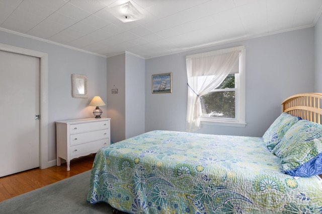 511 Webhannet Dr, Wells, ME 04090 - bedroom featuring ornamental molding and wood finished floors