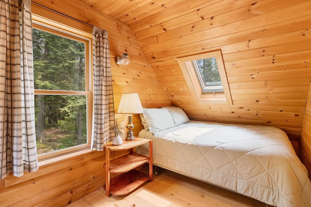 660 Sprague Rd, Waldoboro, ME 04572 - bedroom featuring a skylight, wood finished floors, wood ceiling, and wood walls