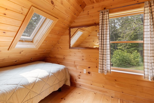 660 Sprague Rd, Waldoboro, ME 04572 - bedroom featuring a skylight, wood walls, lofted ceiling, hardwood / wood-style flooring, and wood ceiling