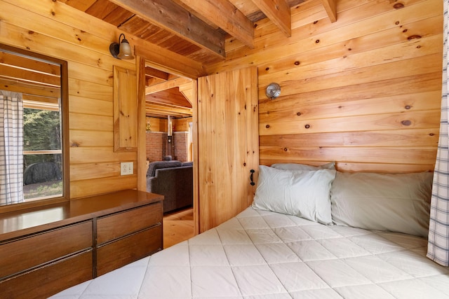 660 Sprague Rd, Waldoboro, ME 04572 - unfurnished bedroom featuring wooden walls and a wooden ceiling with exposed beams