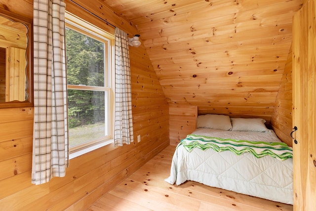 660 Sprague Rd, Waldoboro, ME 04572 - bedroom featuring wooden walls, wooden ceiling, and wood finished floors