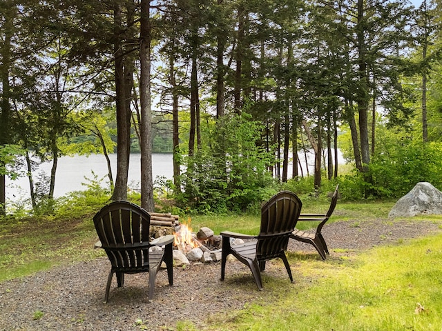 660 Sprague Rd, Waldoboro, ME 04572 - view of yard featuring a fire pit and a water view
