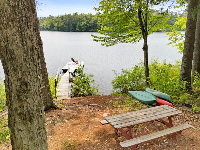 660 Sprague Rd, Waldoboro, ME 04572 - water view featuring a boat dock and a heavily wooded area